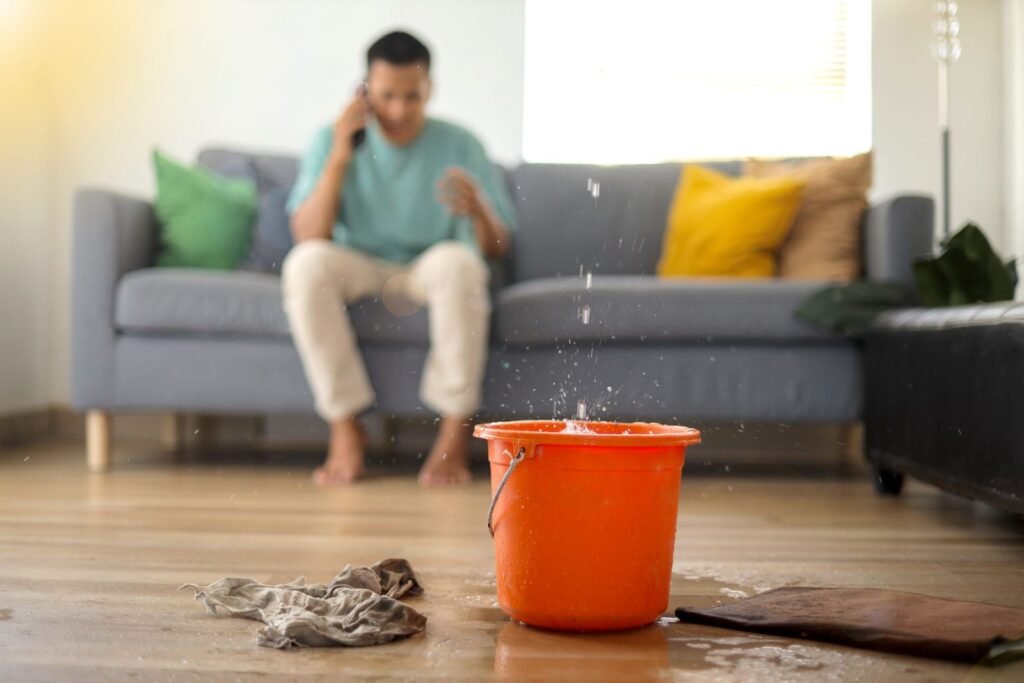 Water flooding from a ceiling inside a home